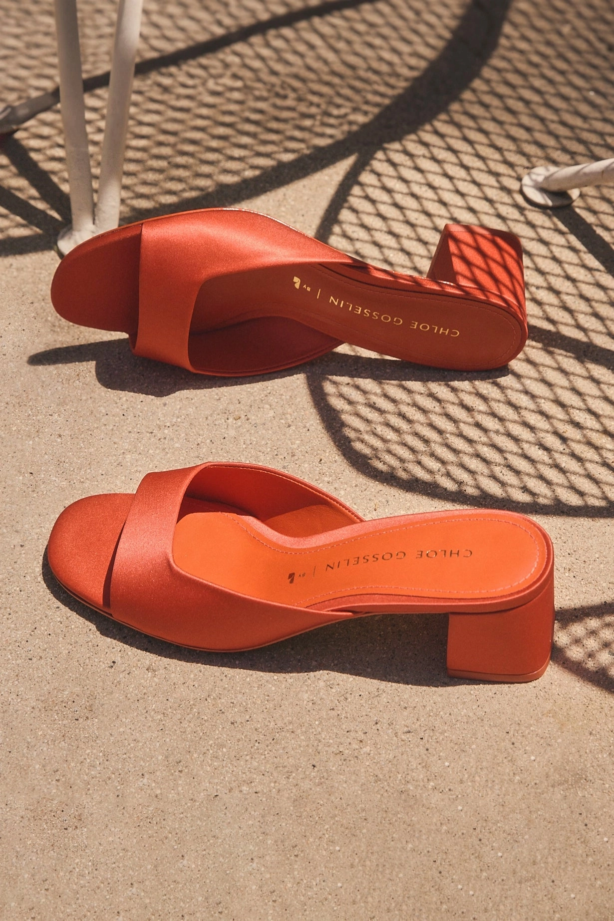 Sturdy Build Chloe Gosselin by Larroud Anah Mule In Orange Sunrise Satin