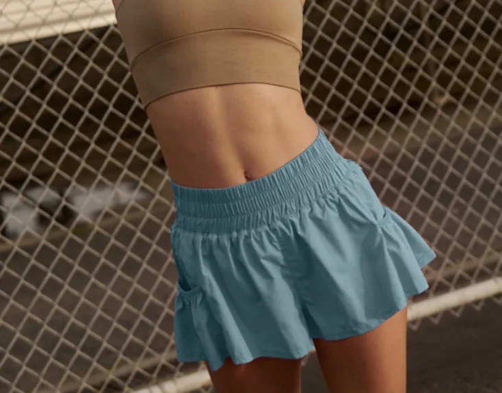 Reinforced Stress Points Variable Tension Adjustment Free People Movement Get Your Flirt On Short in Eucalyptus